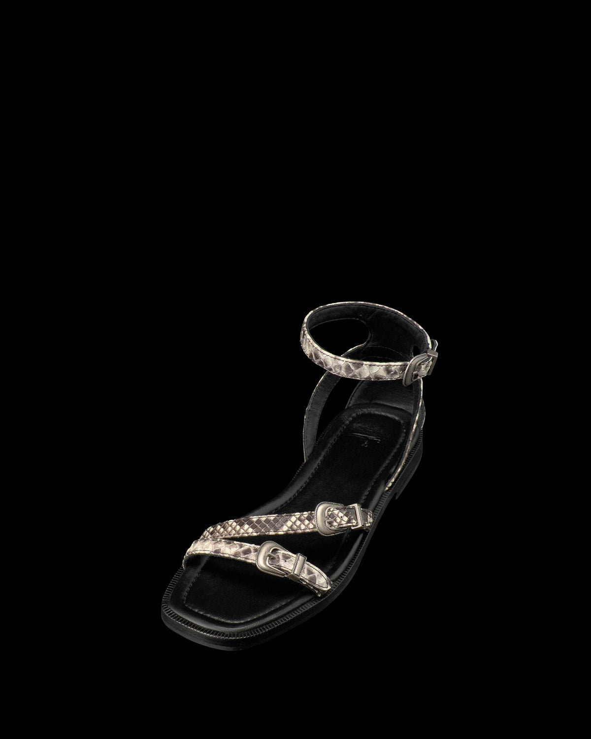 Quarterfront view of The Blakely - Black/Bone on plain background