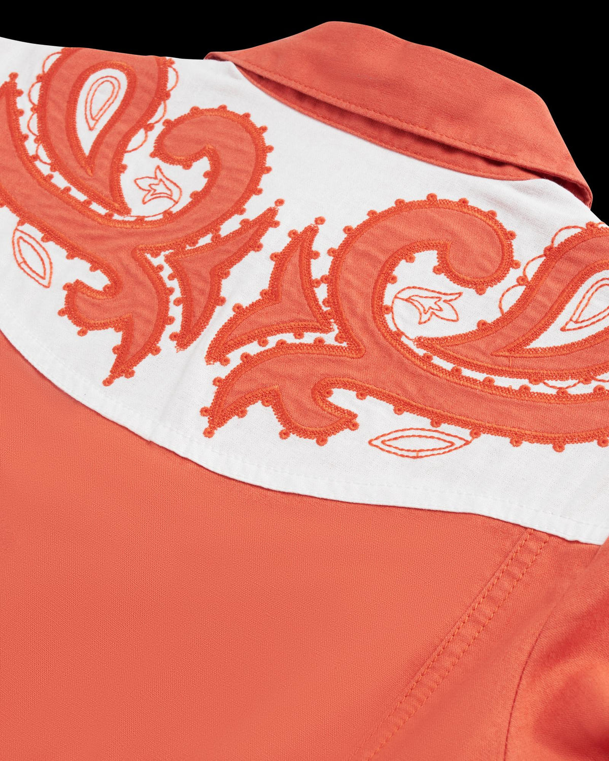 Closeup detail view of Women's L/S Applique Mini Dress - Ginger Spice / Cloud