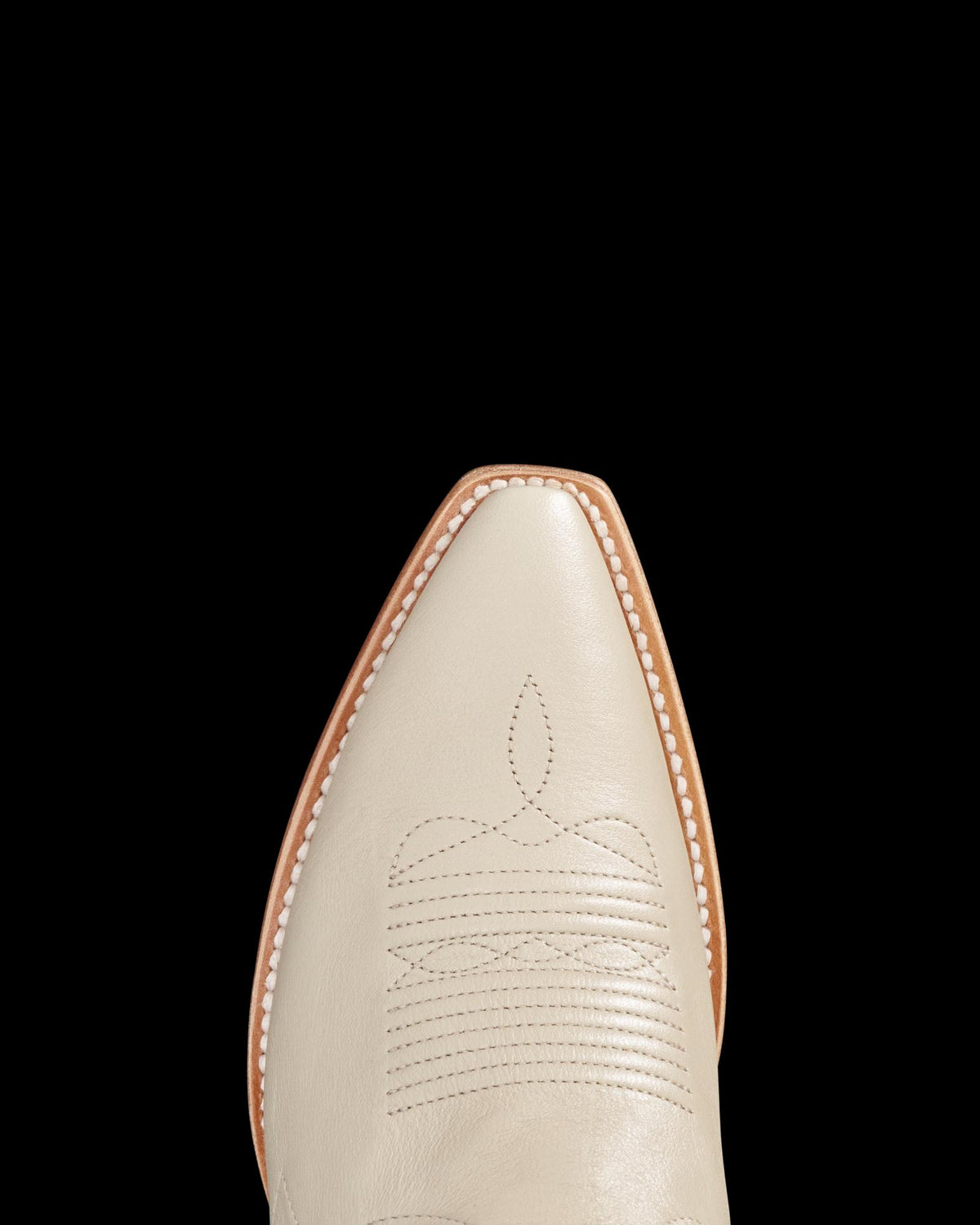 Toe view of The Lynn - Cream on plain background