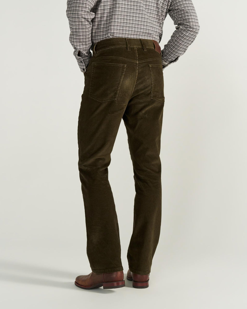 Back view of Men's Slim Straight Stretch Corduroy - Dark Olive on model