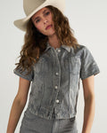 Front view of Women's S/S Denim Top - Blue / White on model