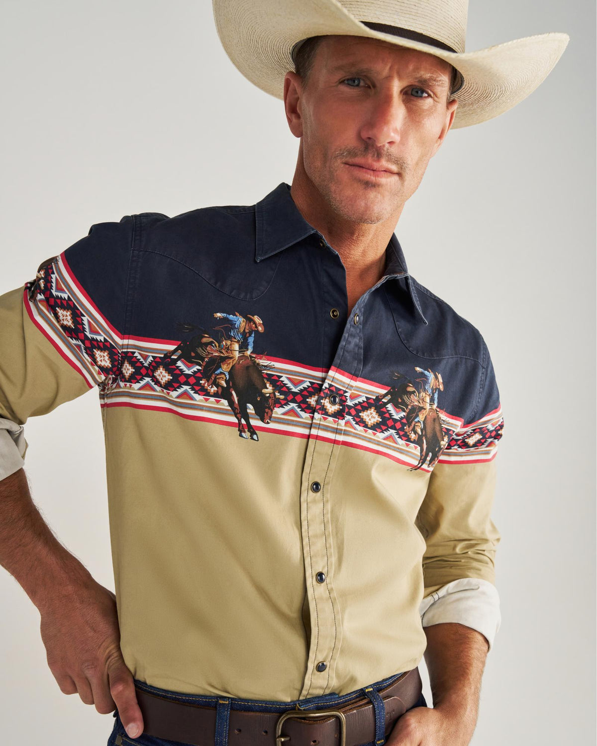 Closeup detail view of Men's Thorn Stopper Pearl Snap LS - Navy / Khaki