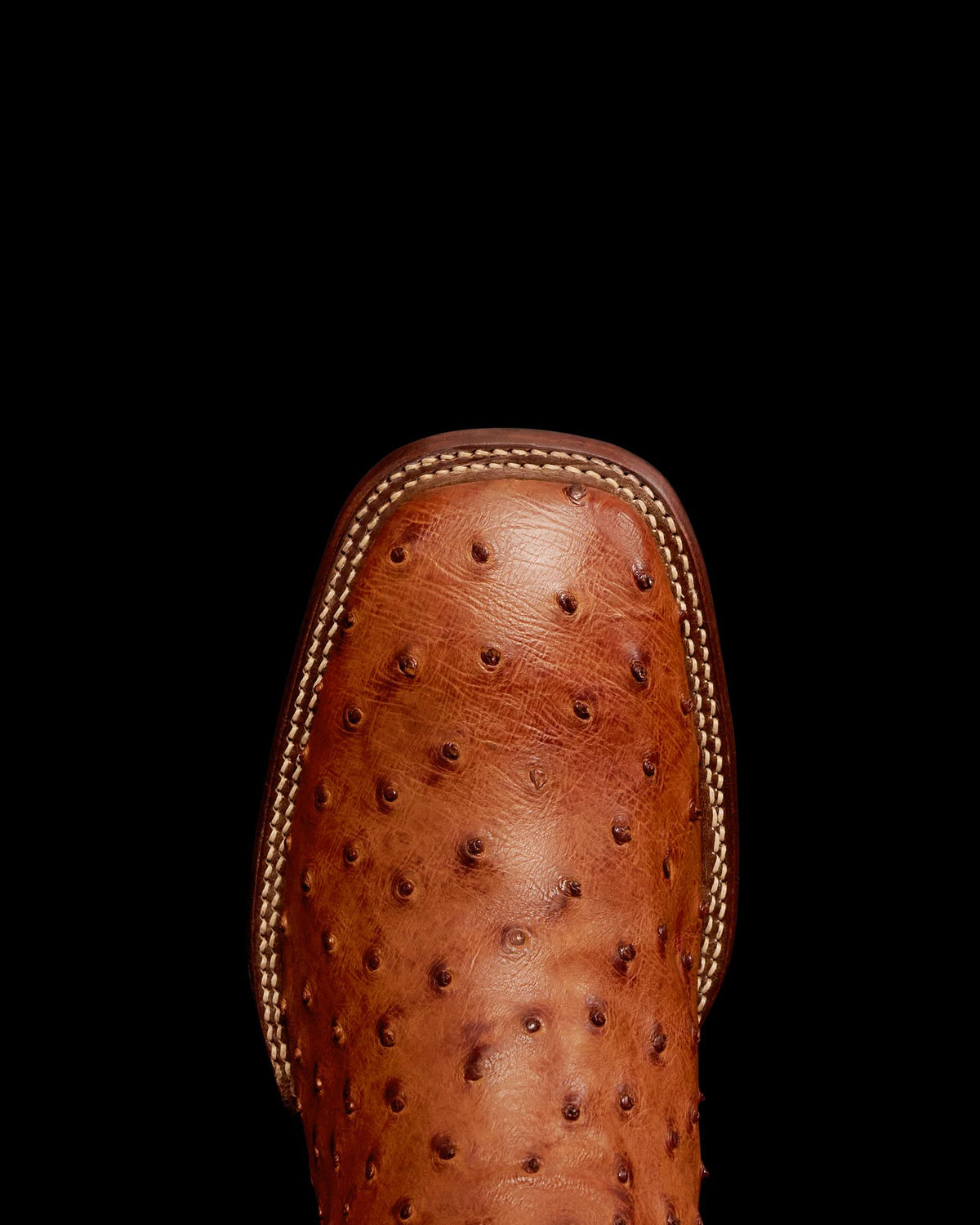 Toe view of The Emmitt II - Pecan Ostrich on plain background