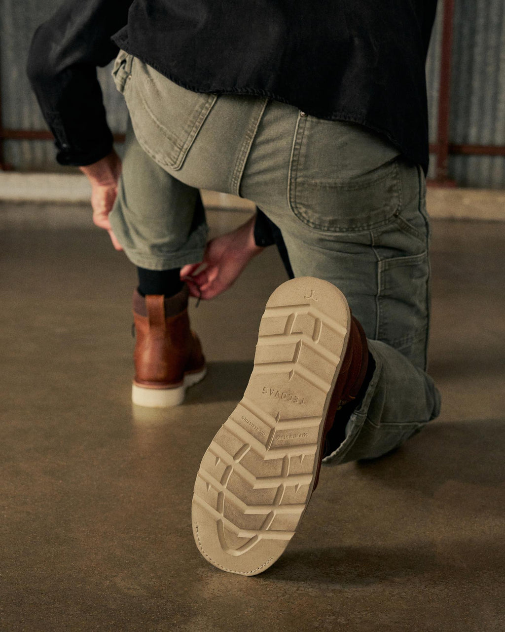 Toe view of The LH WP Moc Comp Toe Work Boot - Saddle Cowhide on plain background