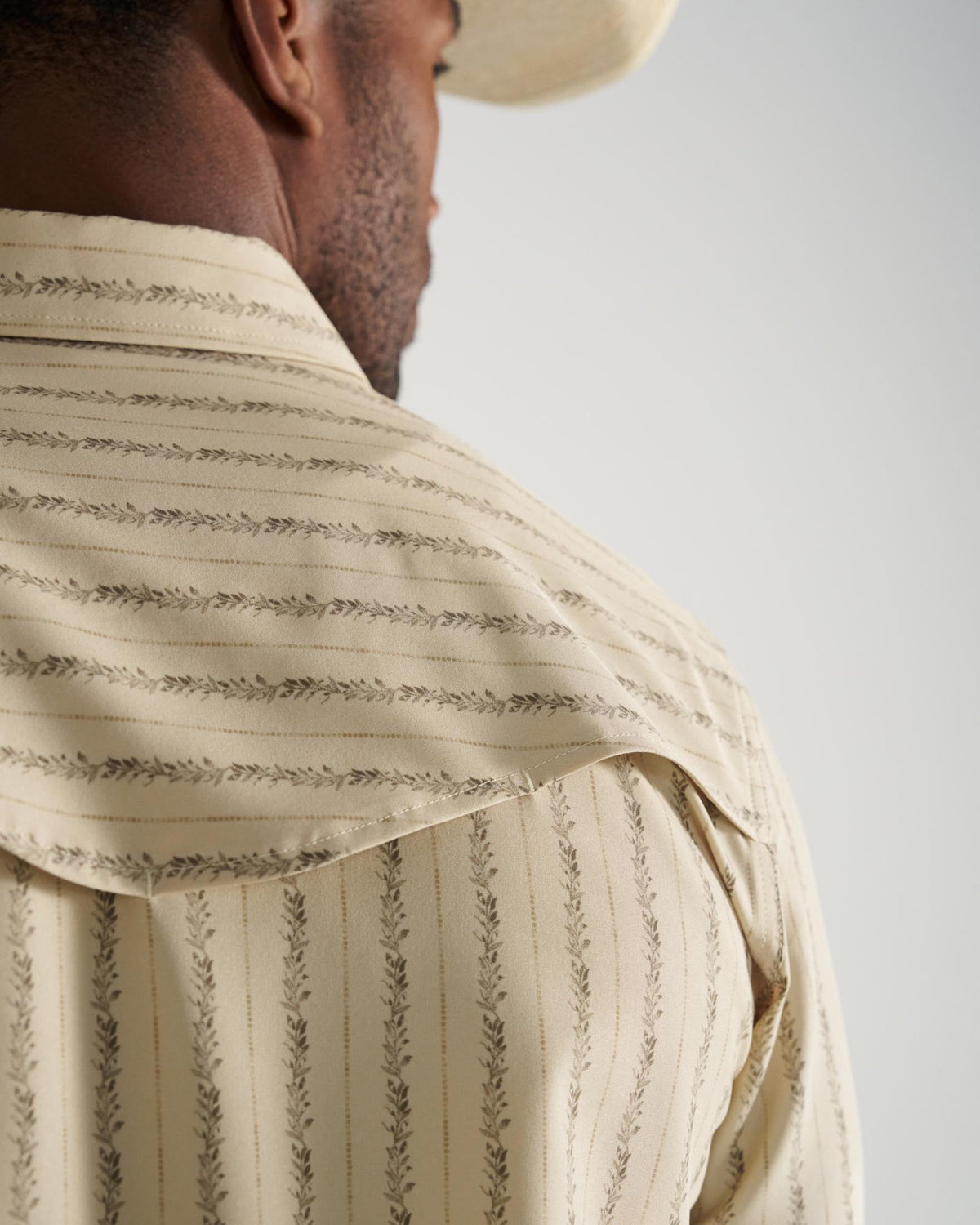 Closeup detail view of Men's Performance Western Pearl Snap - Sandstone/Multi