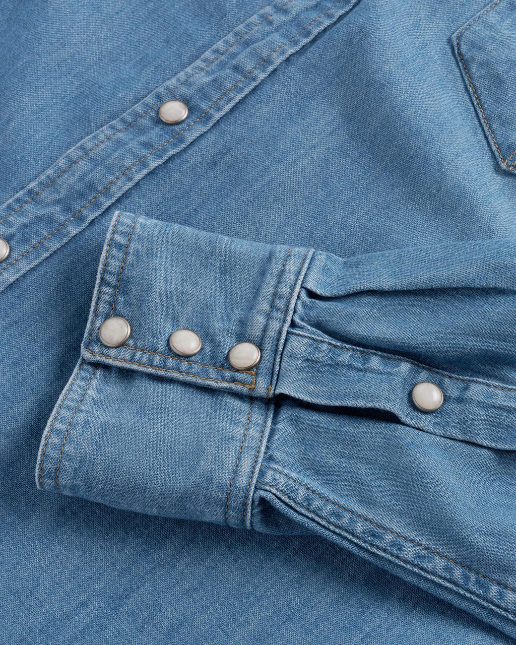 Closeup detail view of Men's Denim Pearl Snap LS - Turquoise / Multi