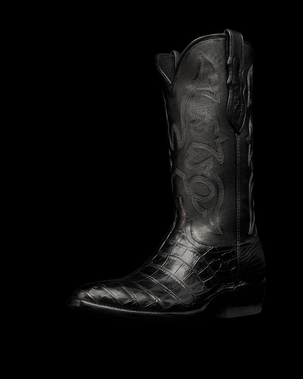 Quarterfront view of The Stallion x Tecovas Boot - Midnight Giant Gator on plain background