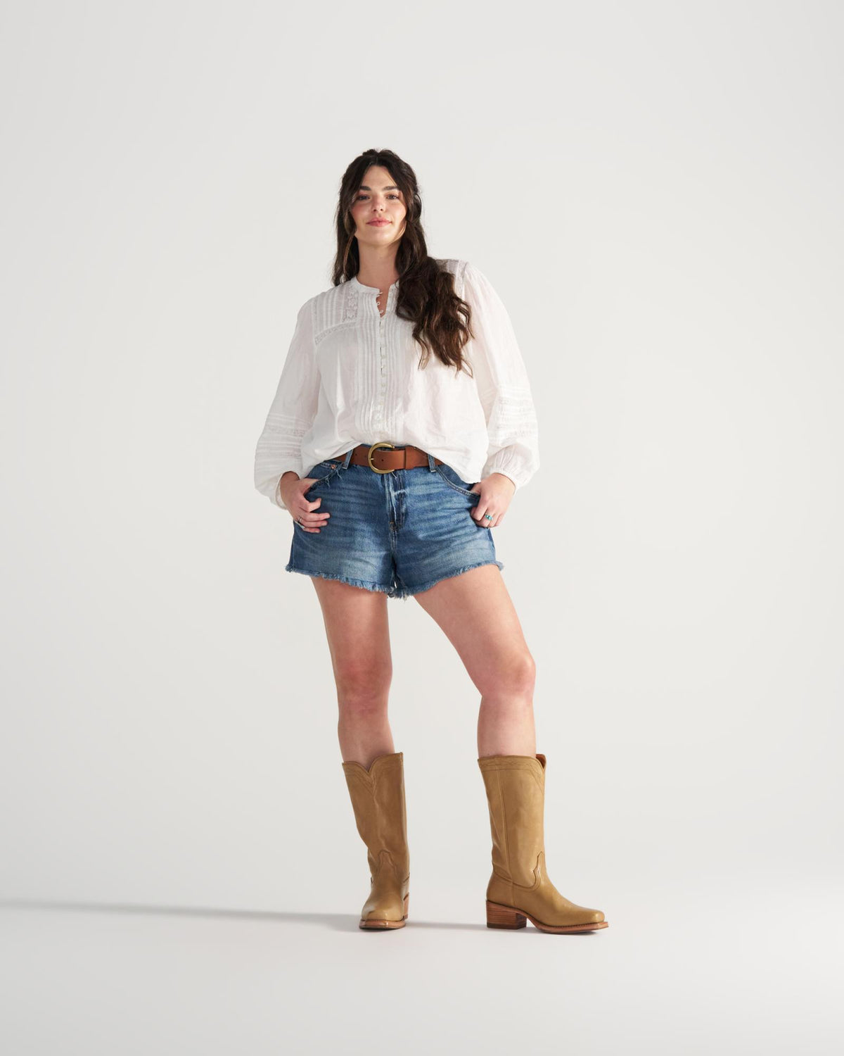 Full view of The Charlie Wide Calf - Camel Cowhide on model