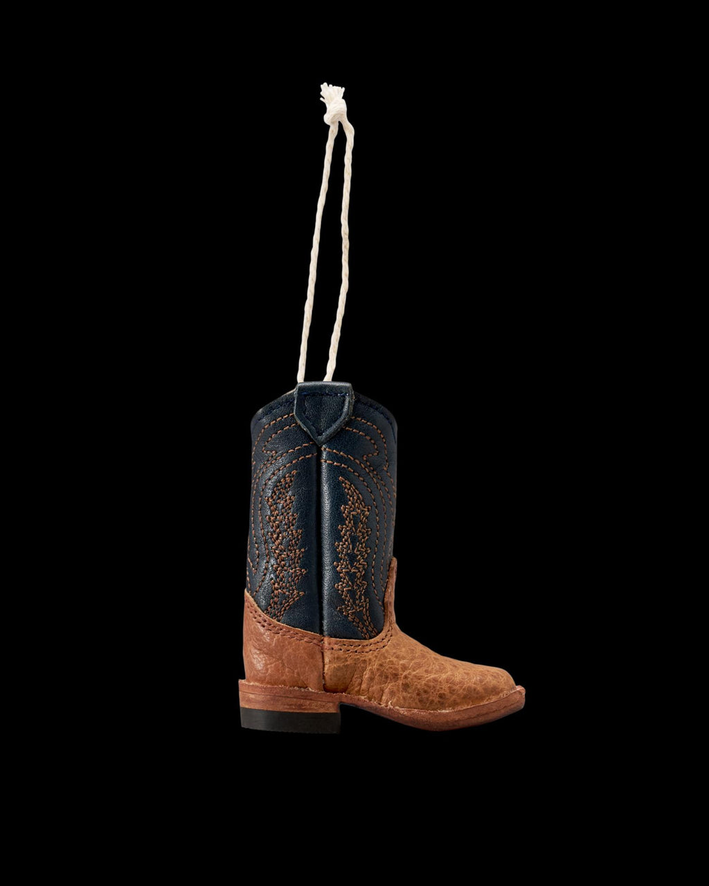 Profile view of Doc Boot Ornament - Tan on plain background