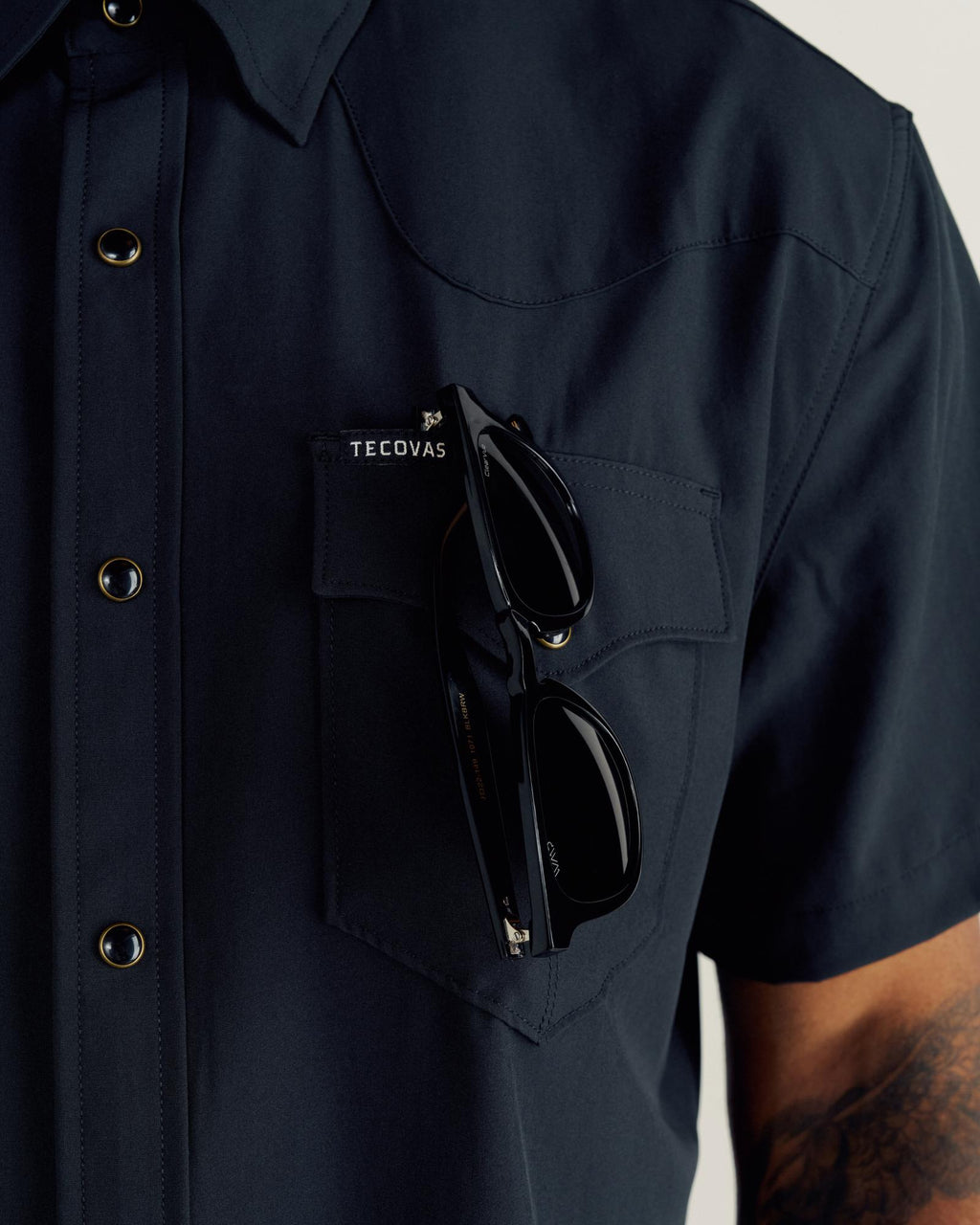 Closeup detail view of Men's Performance Western Pearl Snap SS - Black