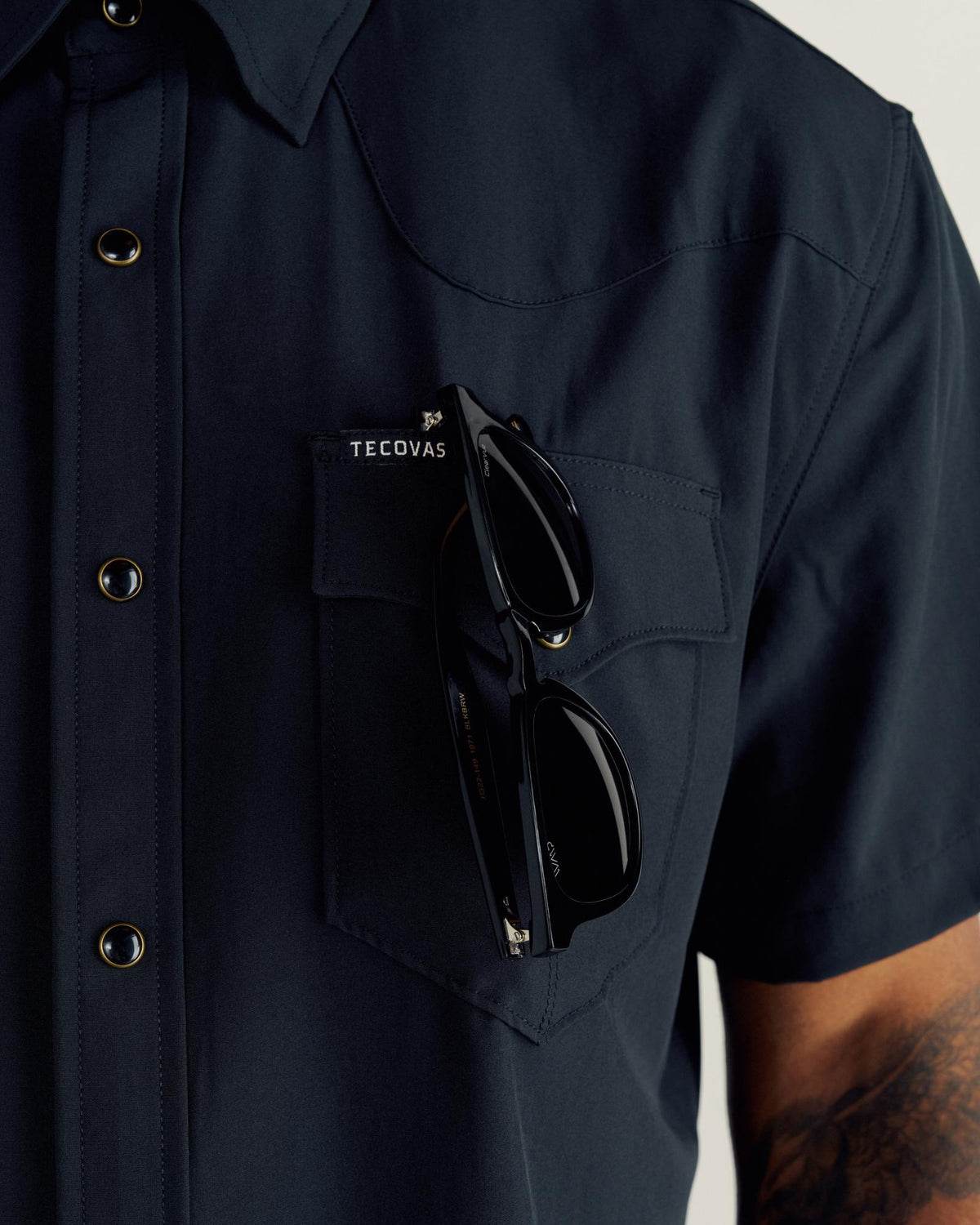 Closeup detail view of Men's Performance Western Pearl Snap SS - Black