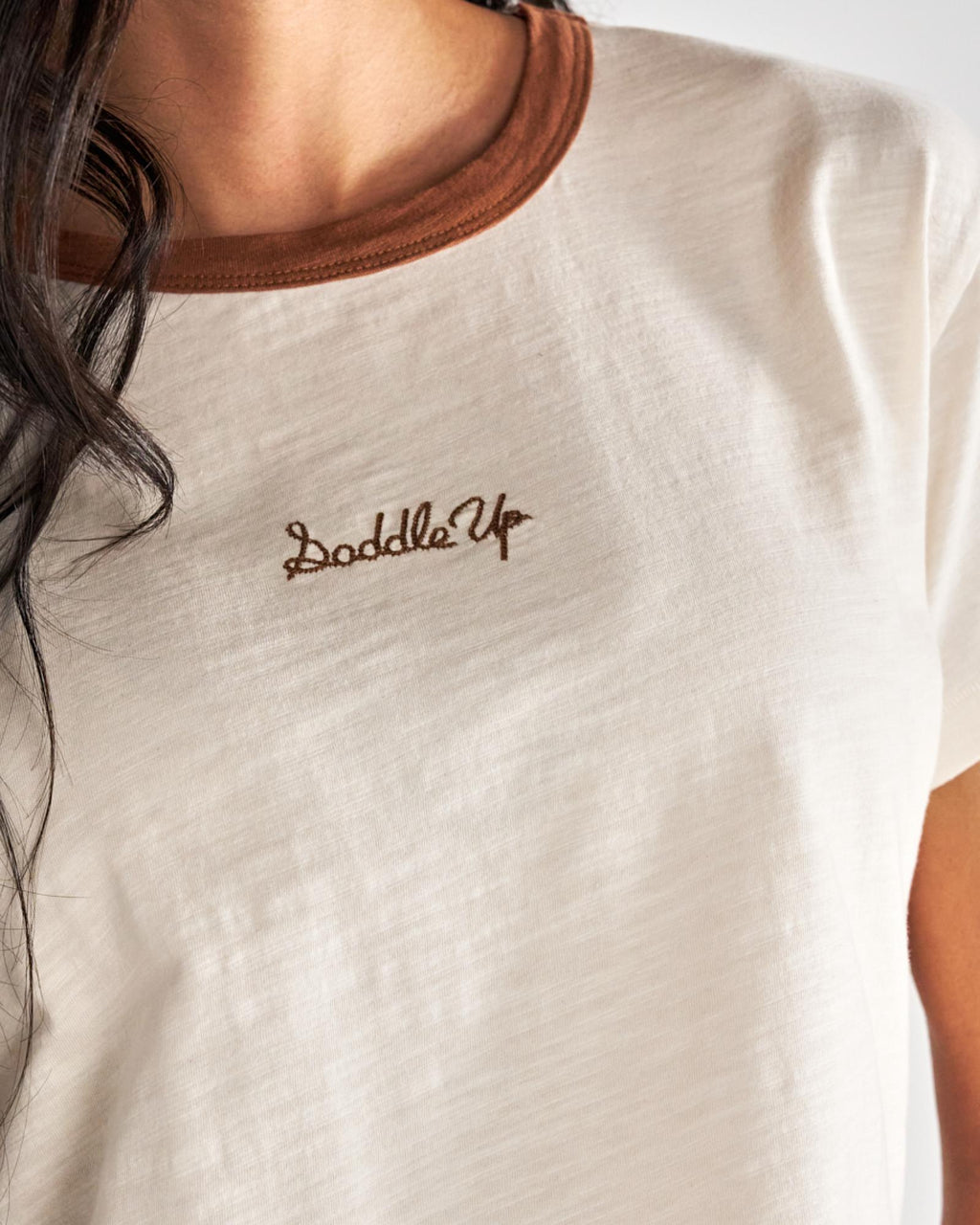 Closeup detail view of Women's Vintage Ringer Tee - Cream/Tan