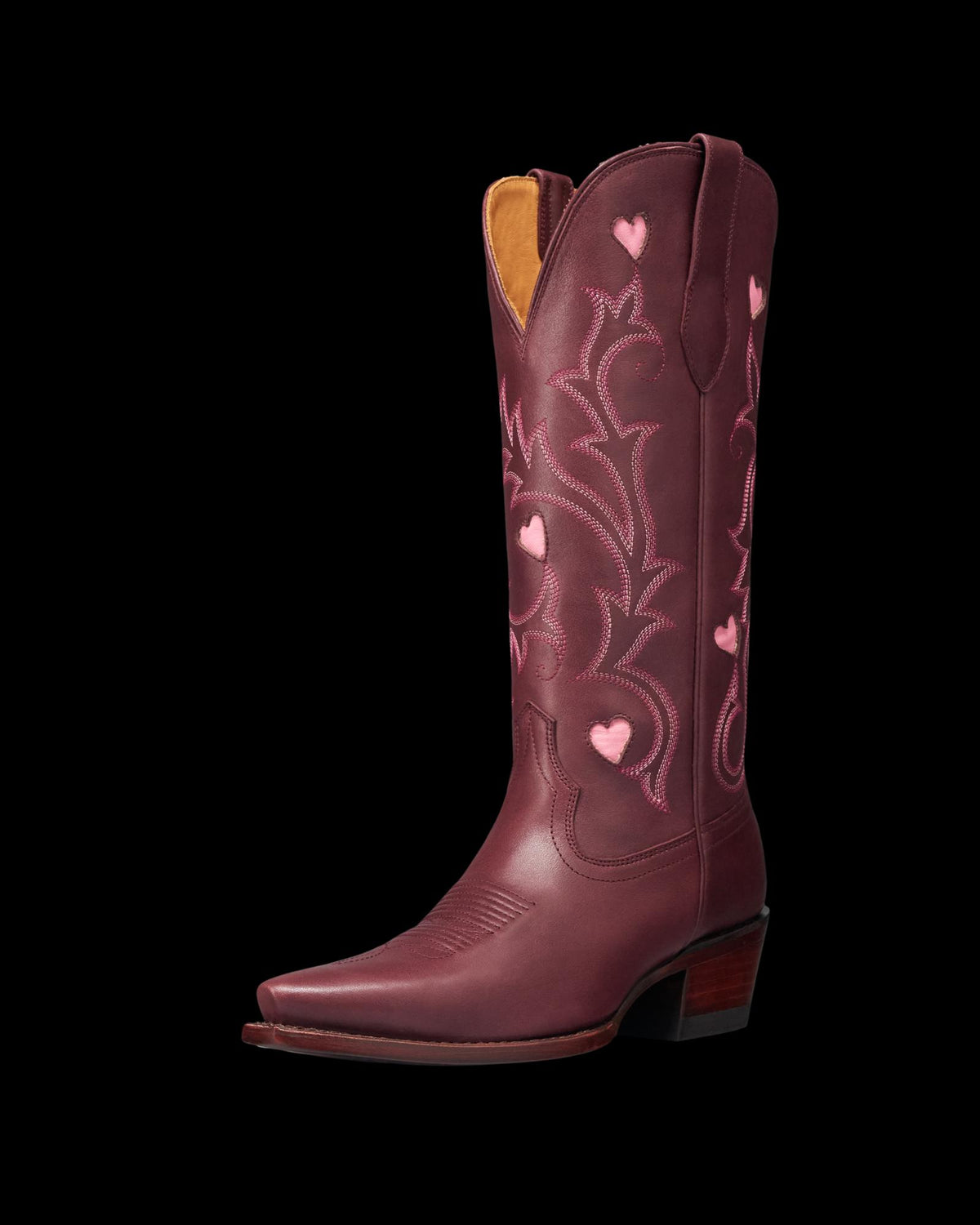 Quarterfront view of The Annie Hearts - Wine Cowhide on plain background