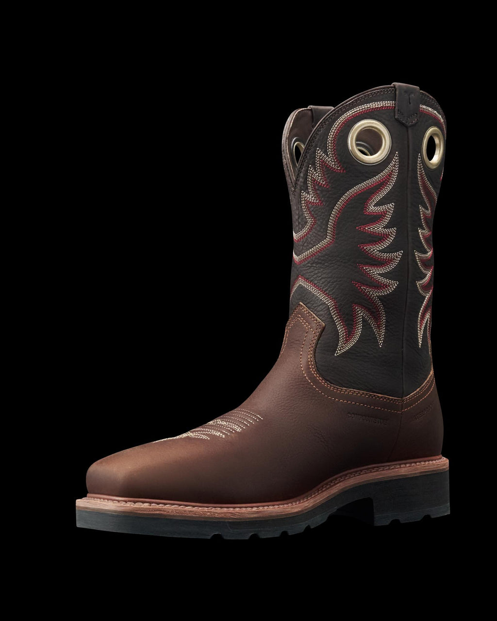 LongHaul Waterproof Square Composite Toe Work Boot in Tobacco / Black Cowhide. A brown and black cowhide leather cowboy boot with red and white stitching, decorative patterns, and pull tabs featuring large metal-reinforced holes.