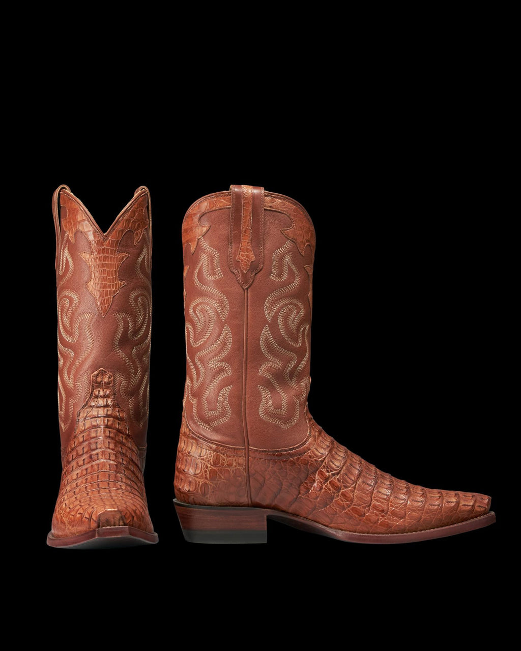 A pair of The Garrett Hornback Caiman cowboy boots in rich pecan brown, featuring textured, patterned hornback caiman leather and decorative stitching on the shafts, shown side by side on a white background.