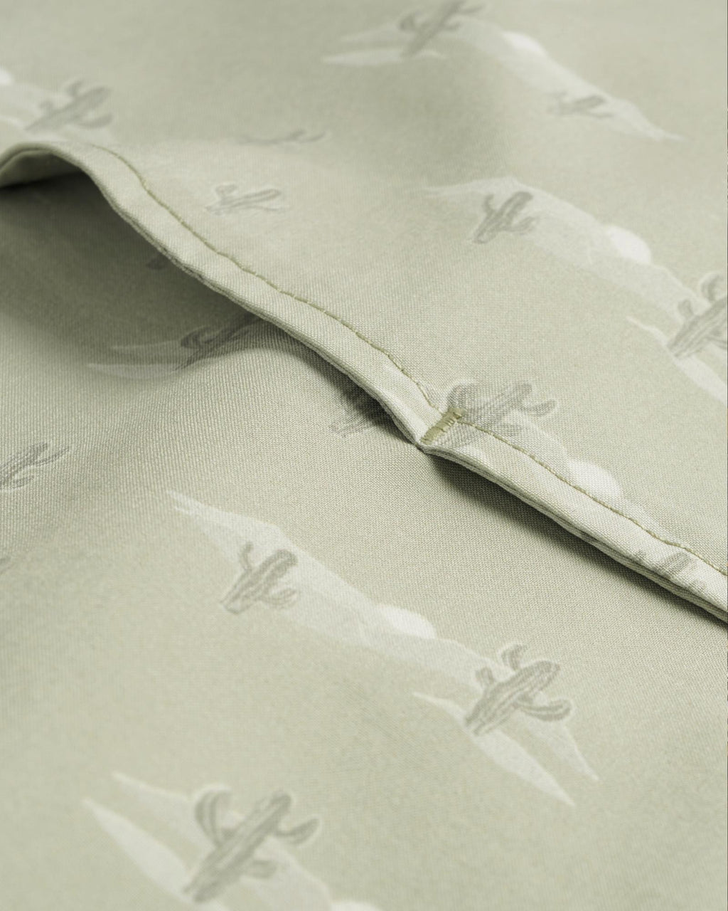 Closeup detail view of Men's Performance Western Short Sleeve Pearl Snap - Desert Sage/Light Sand