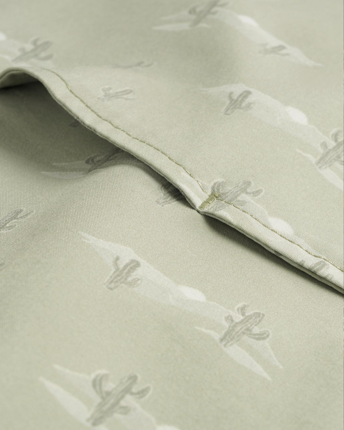 Closeup detail view of Men's Performance Western Short Sleeve Pearl Snap - Desert Sage/Light Sand
