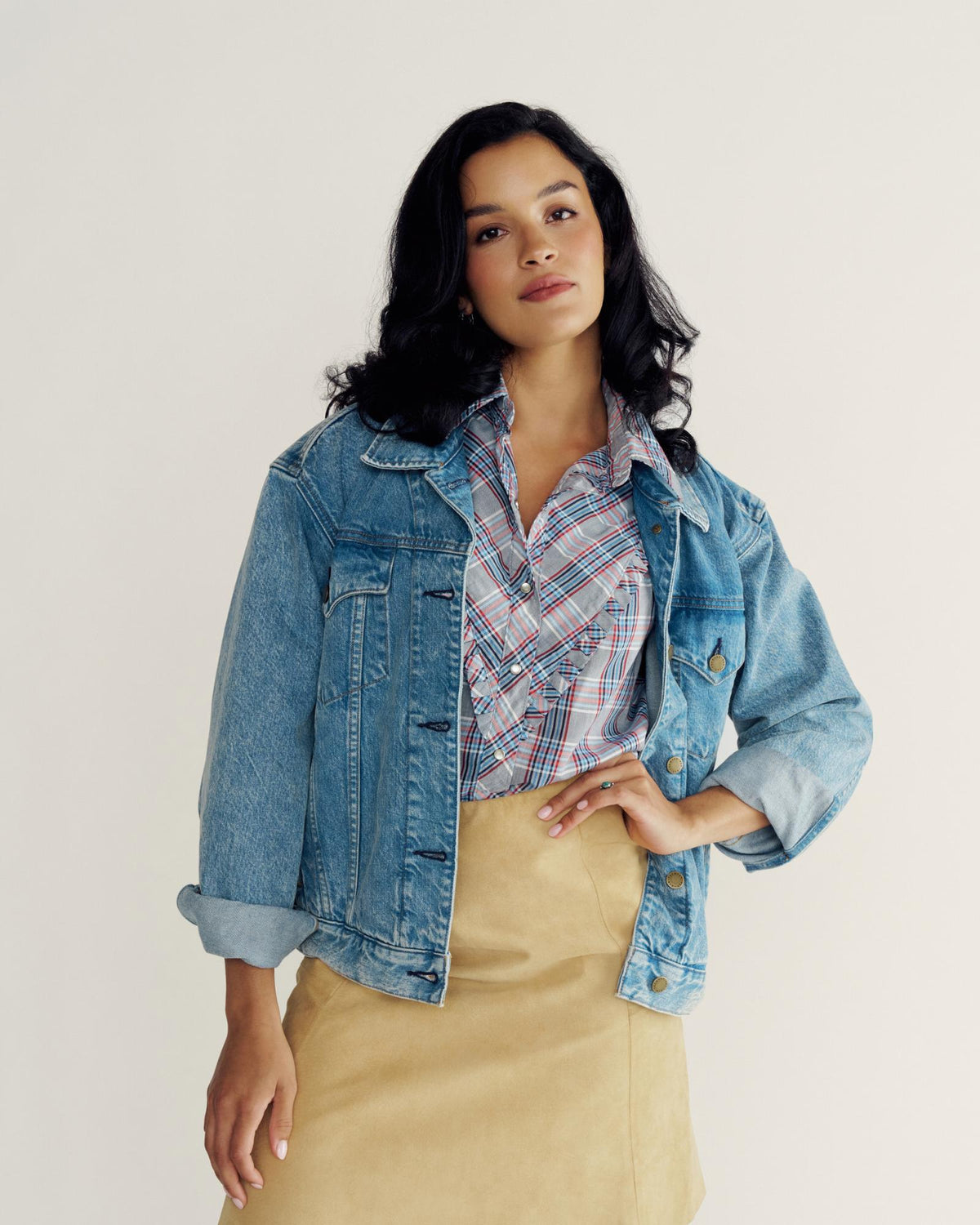 Front view of Women's Denim Trucker Jacket - Medium Wash on model