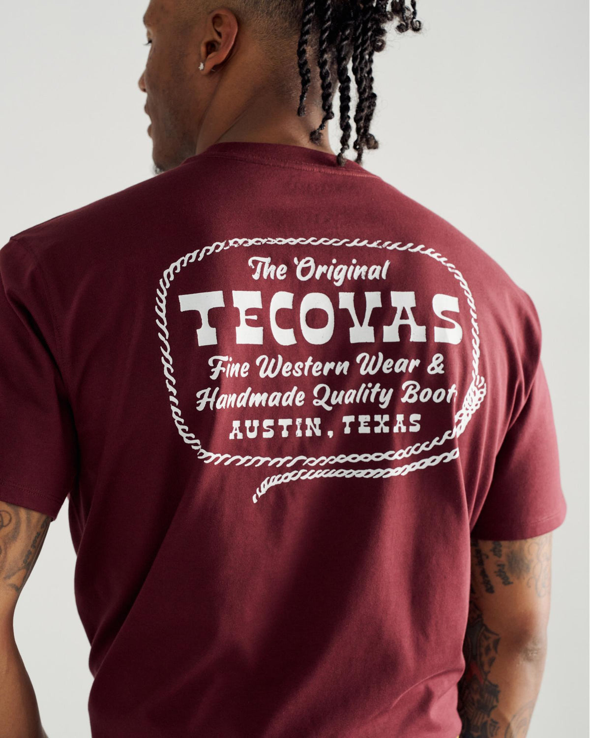 Back view of Men's Original Tecovas Rope Tee - Port / Bone on model