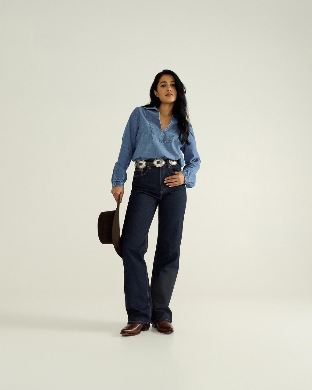 Full view of Women's L/S Denim Popover Top - Medium Wash on model