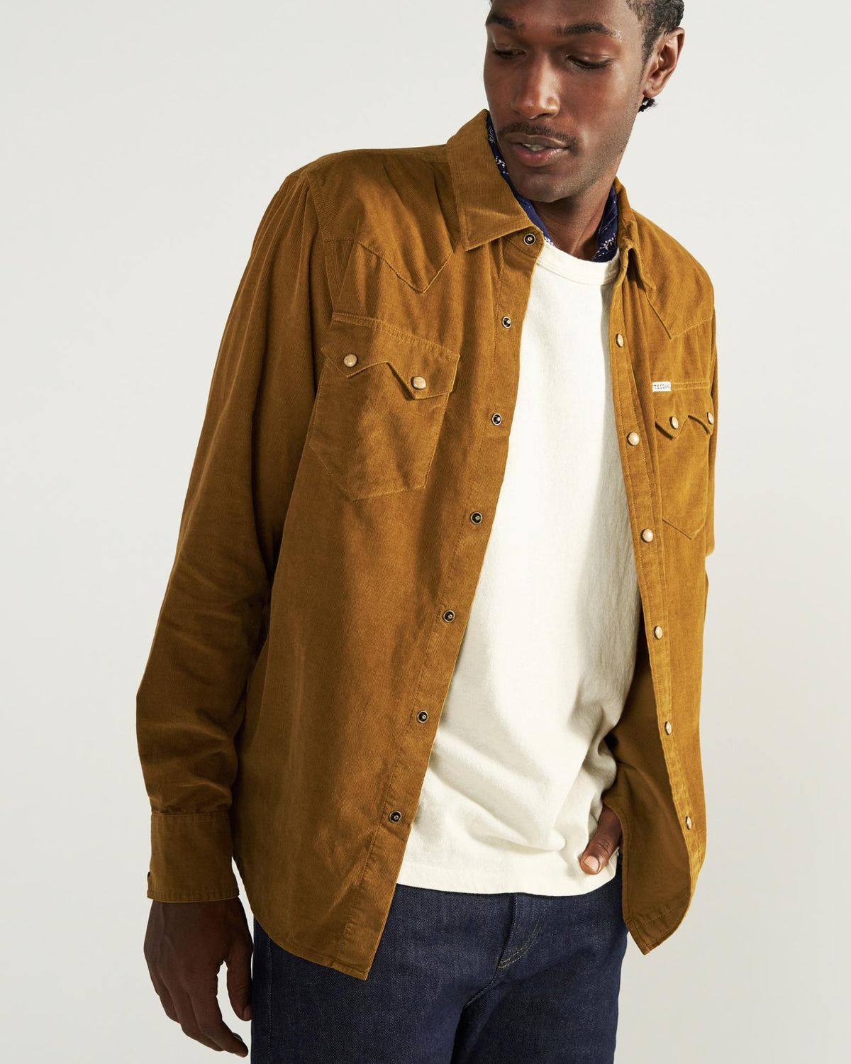 Closeup detail view of Men's Texas Weight Corduroy Pearl Snap - Bronze