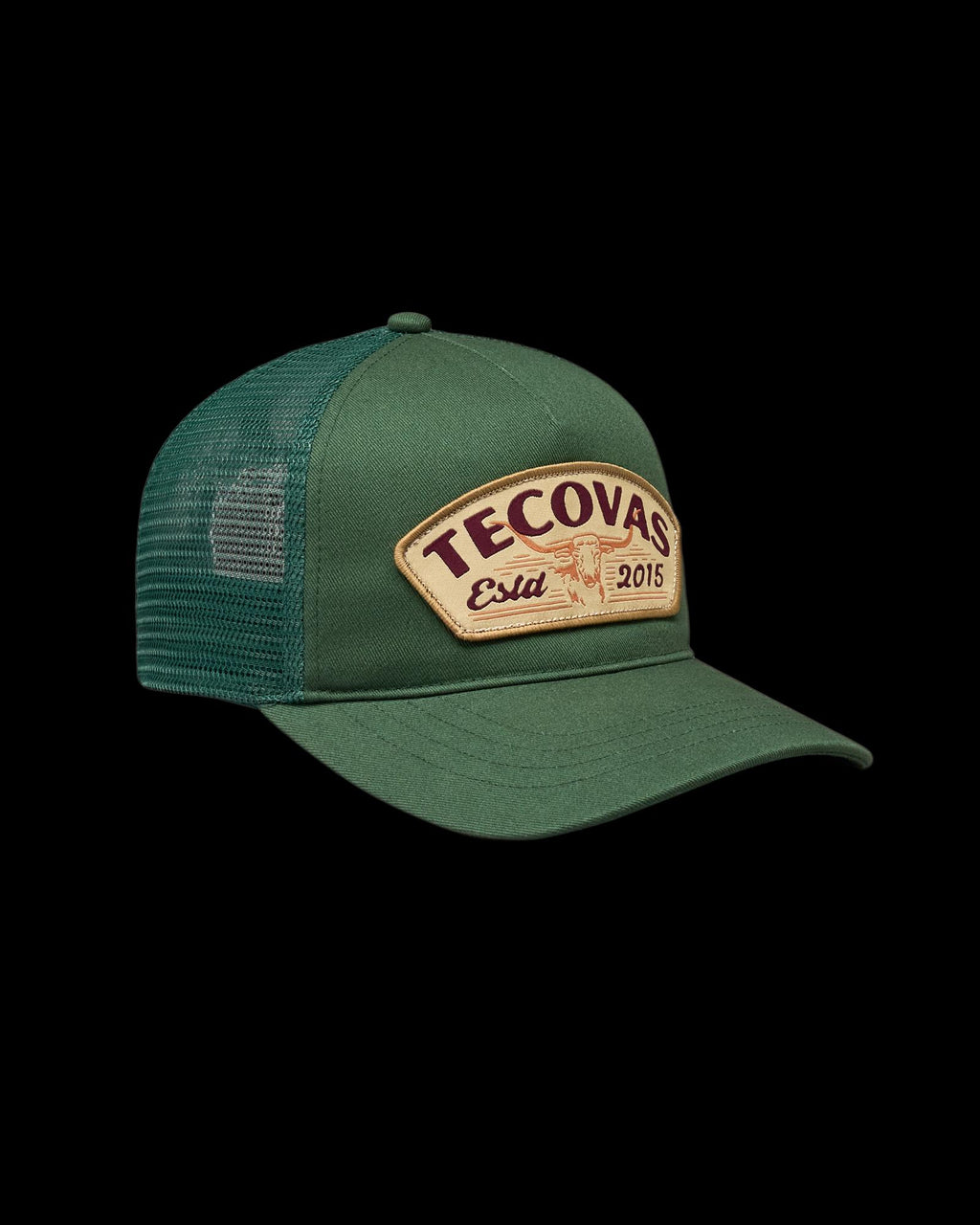 Quarterfront view of Longhorn Badge Trucker - Hunter Green on plain background