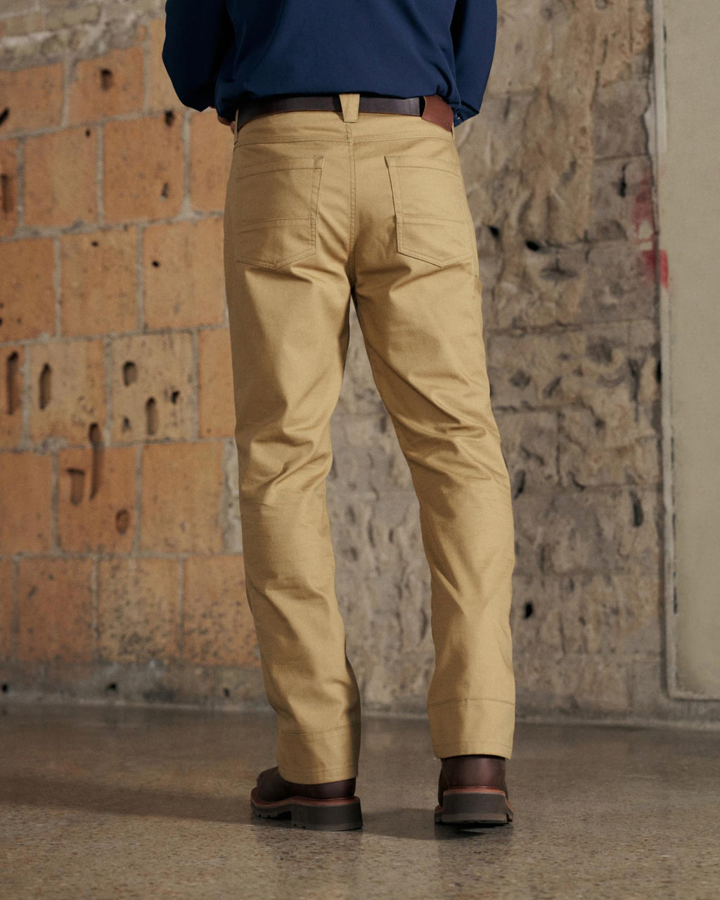 Back view of Men's Work Pant - Desert Tan on model