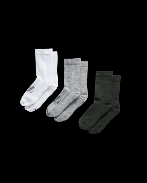 Quarterfront view of Crew Socks (3-Pack) - White / Green / Light Gray on plain background