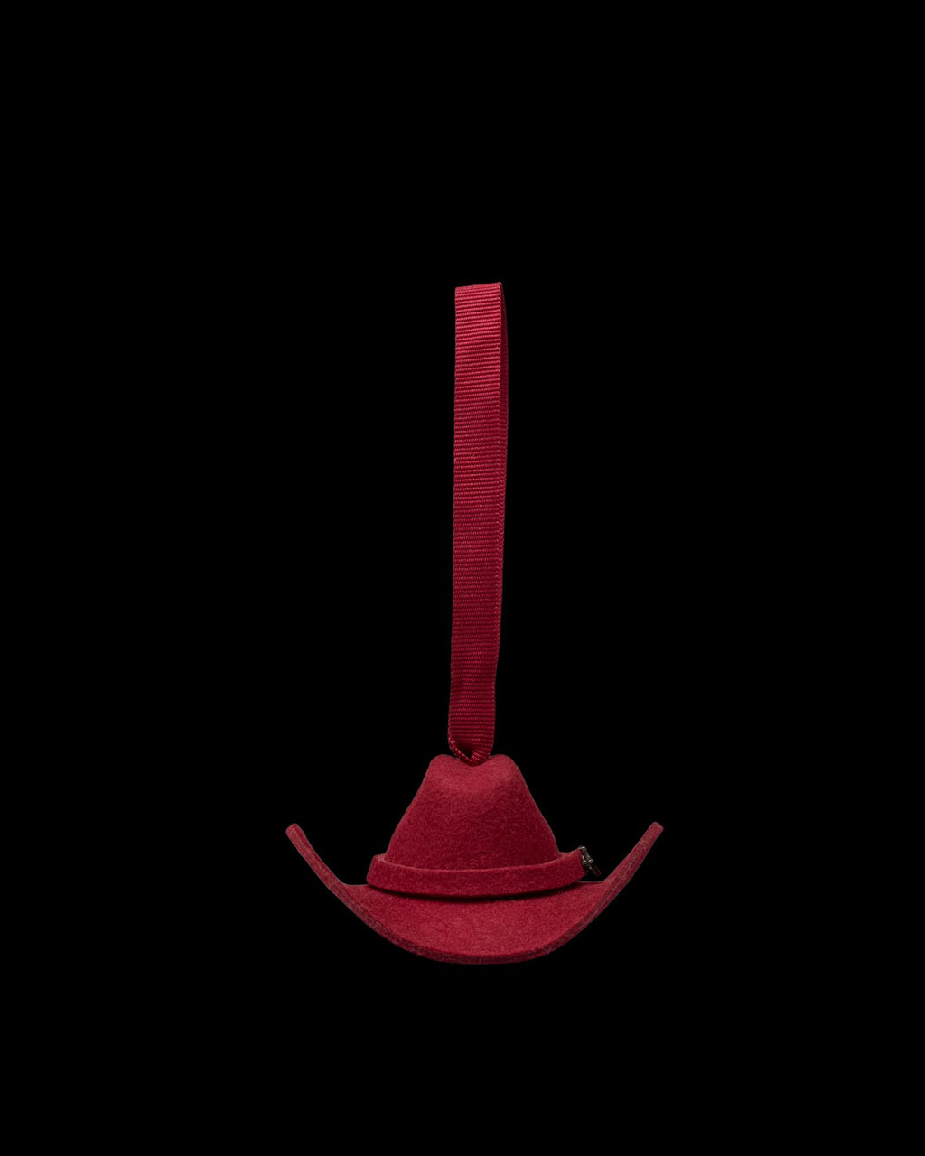 Front view of Cattleman Hat Ornament - Red on plain background