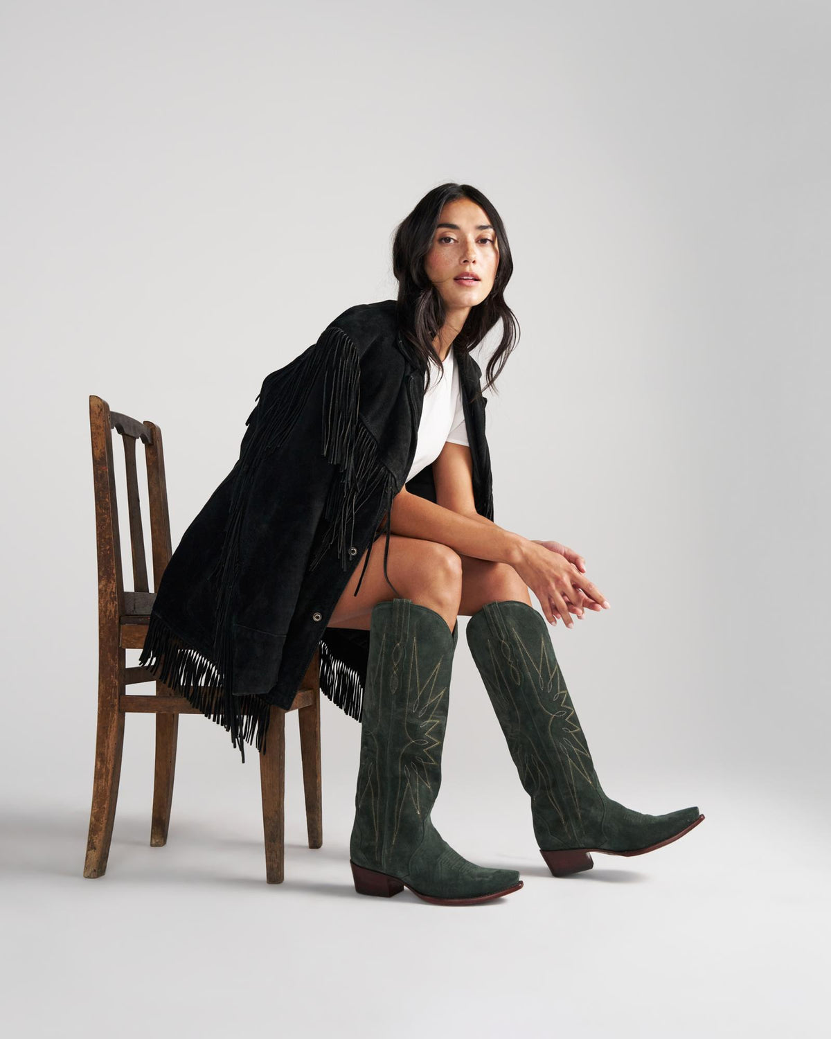 Full view of The Loretta - Hunter Green Suede on model