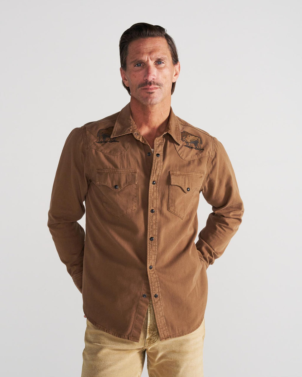 Closeup detail view of Men's Denim Pearl Snap - Tobacco