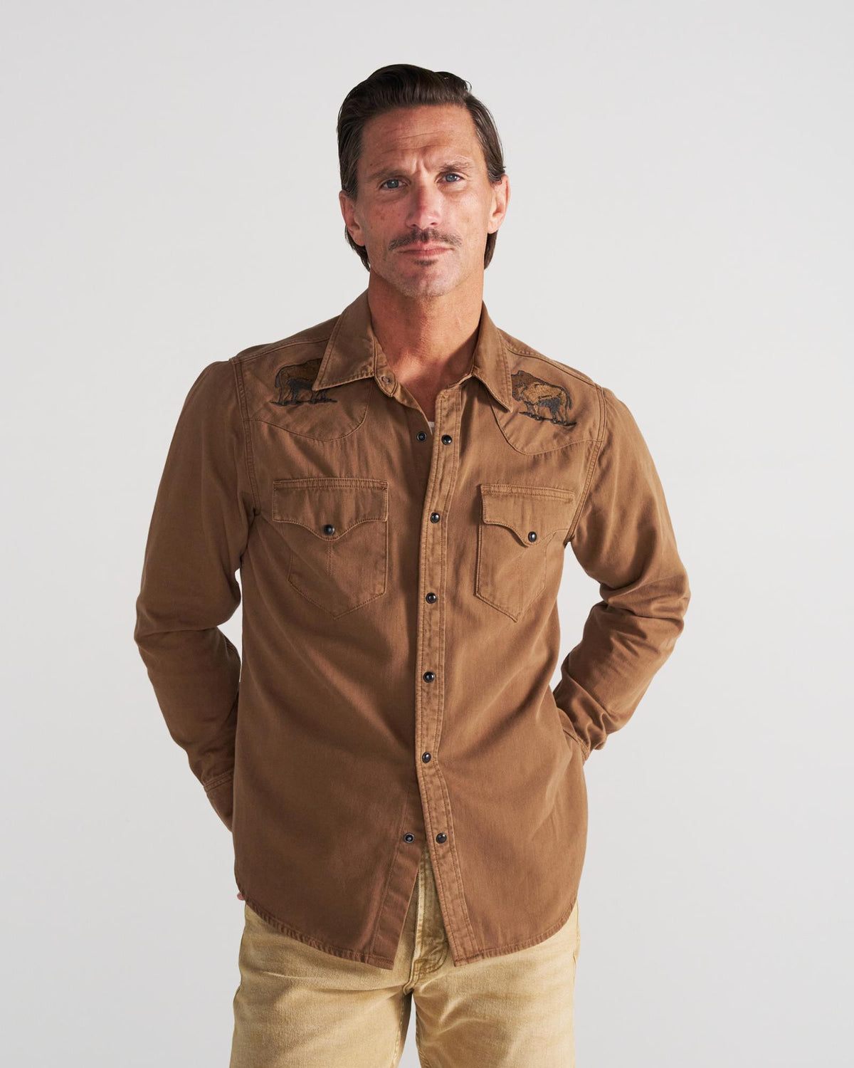 Closeup detail view of Men's Denim Pearl Snap - Tobacco