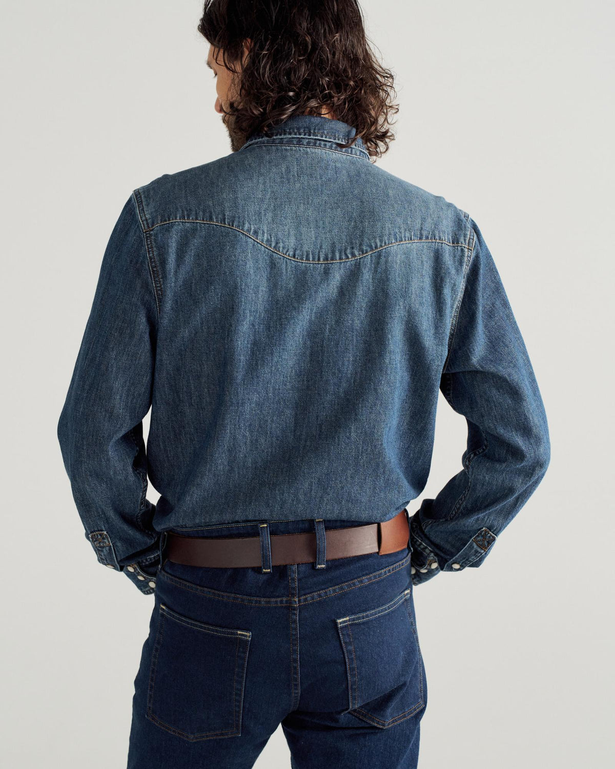 Closeup detail view of Men's Long Sleeve Denim Pearl Snap - Dark Wash