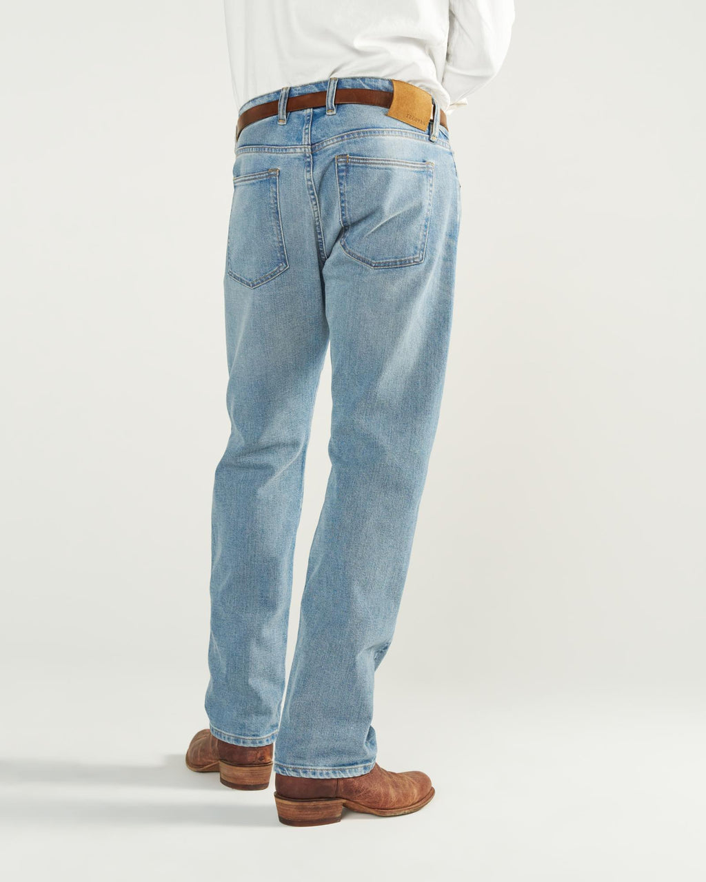 Back view of Men's Straight Crafted Denim - Light Wash on model