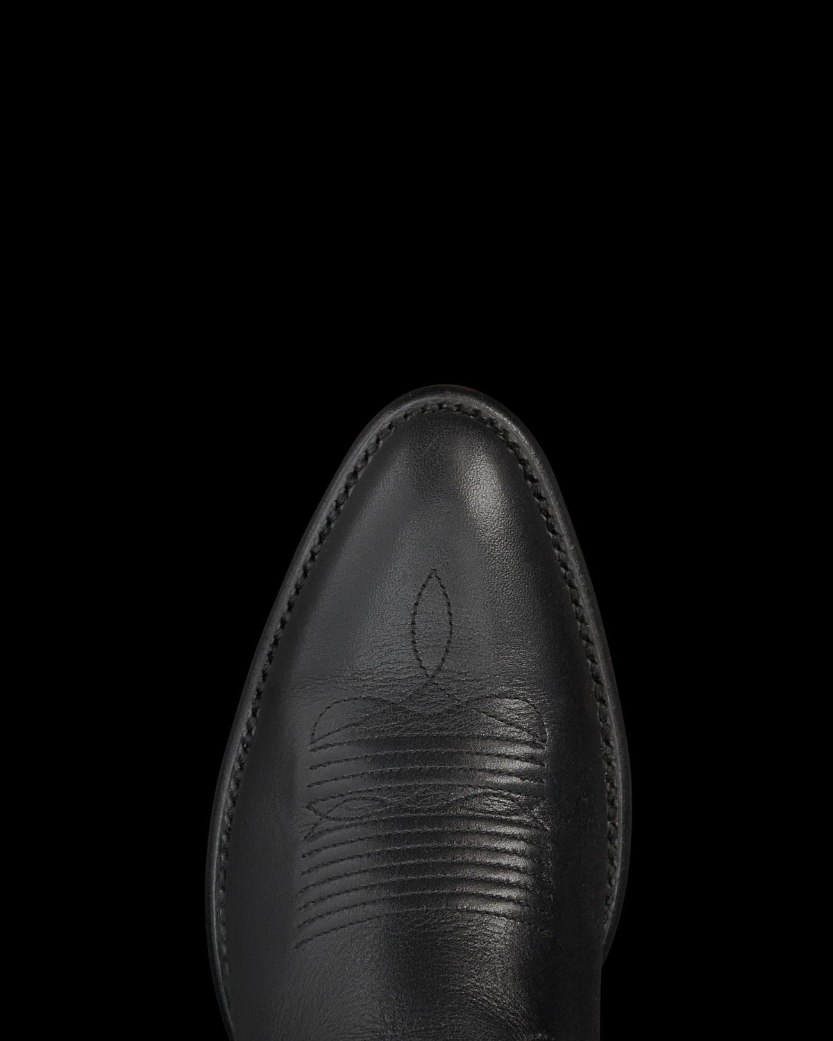 Toe view of The Jane - Midnight Suede on plain background