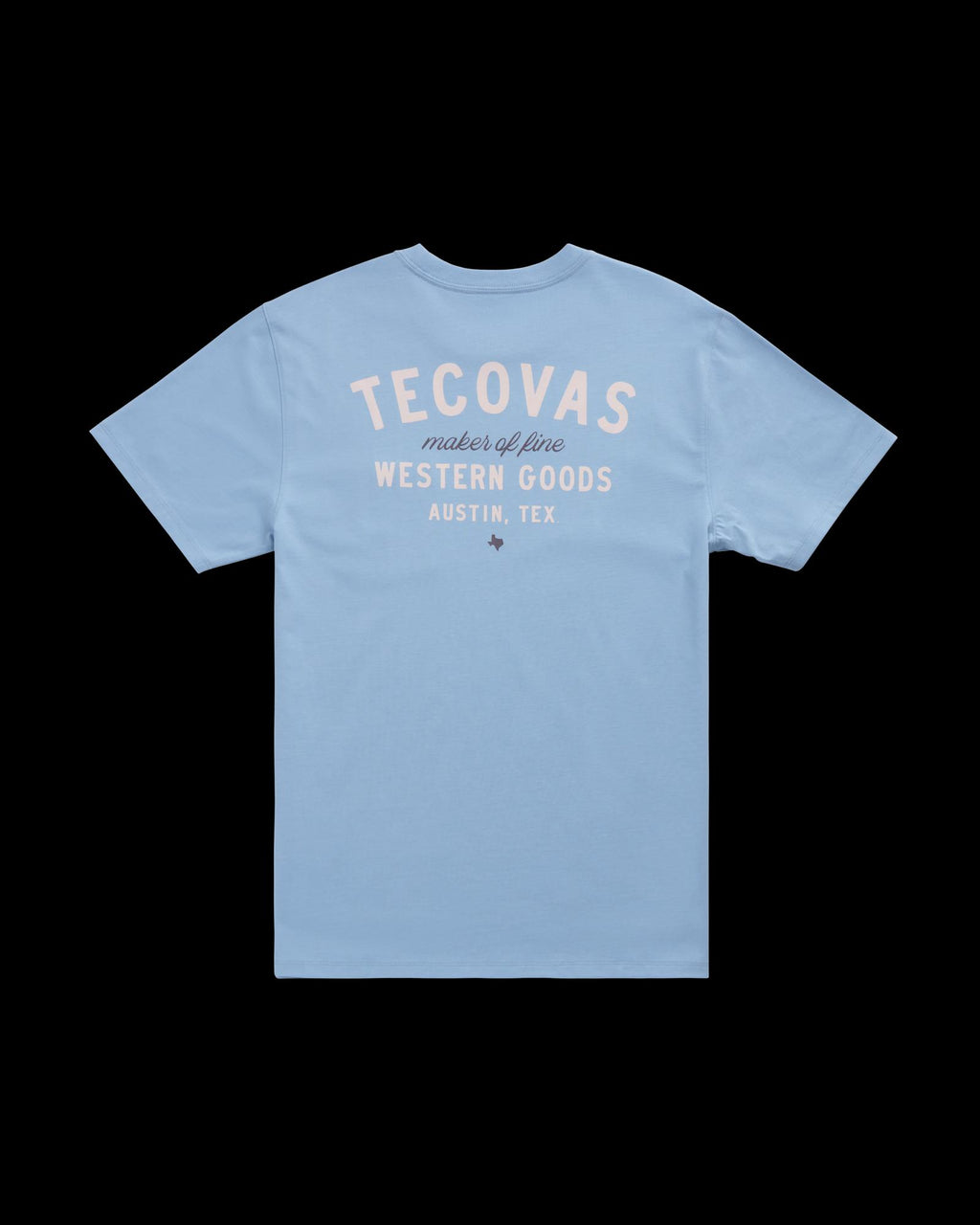 Light blue short-sleeve t-shirt with “Tecovas maker of fine Western Goods Austin, Tex” printed in white and beige text on the back.