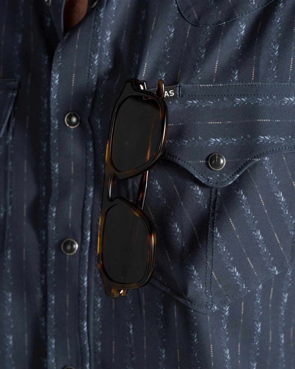Closeup detail view of Men's Performance Western Short Sleeve Pearl Snap - Dark Navy/Multi