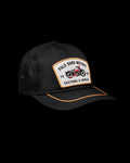 Quarterfront view of Palo Duro Motors 5 Panel Low Pro Trucker - Black on plain background