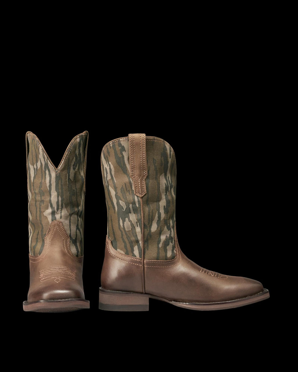 Pair of cowboy boots with brown leather foot and green camouflage-patterned shaft, shown from side and front angles on a white background.