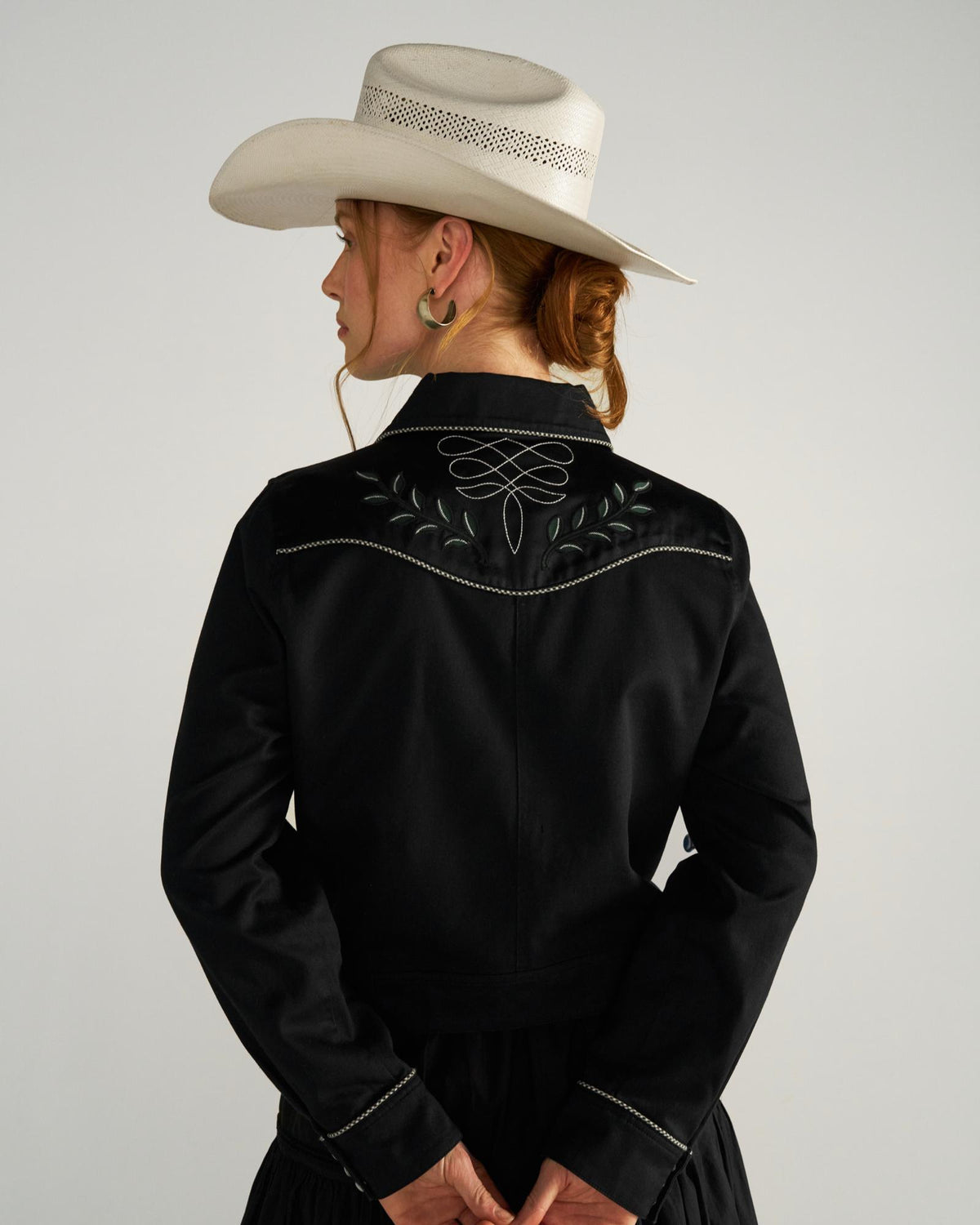 Back view of Women's Embroidered Dolly Jacket - Black on model
