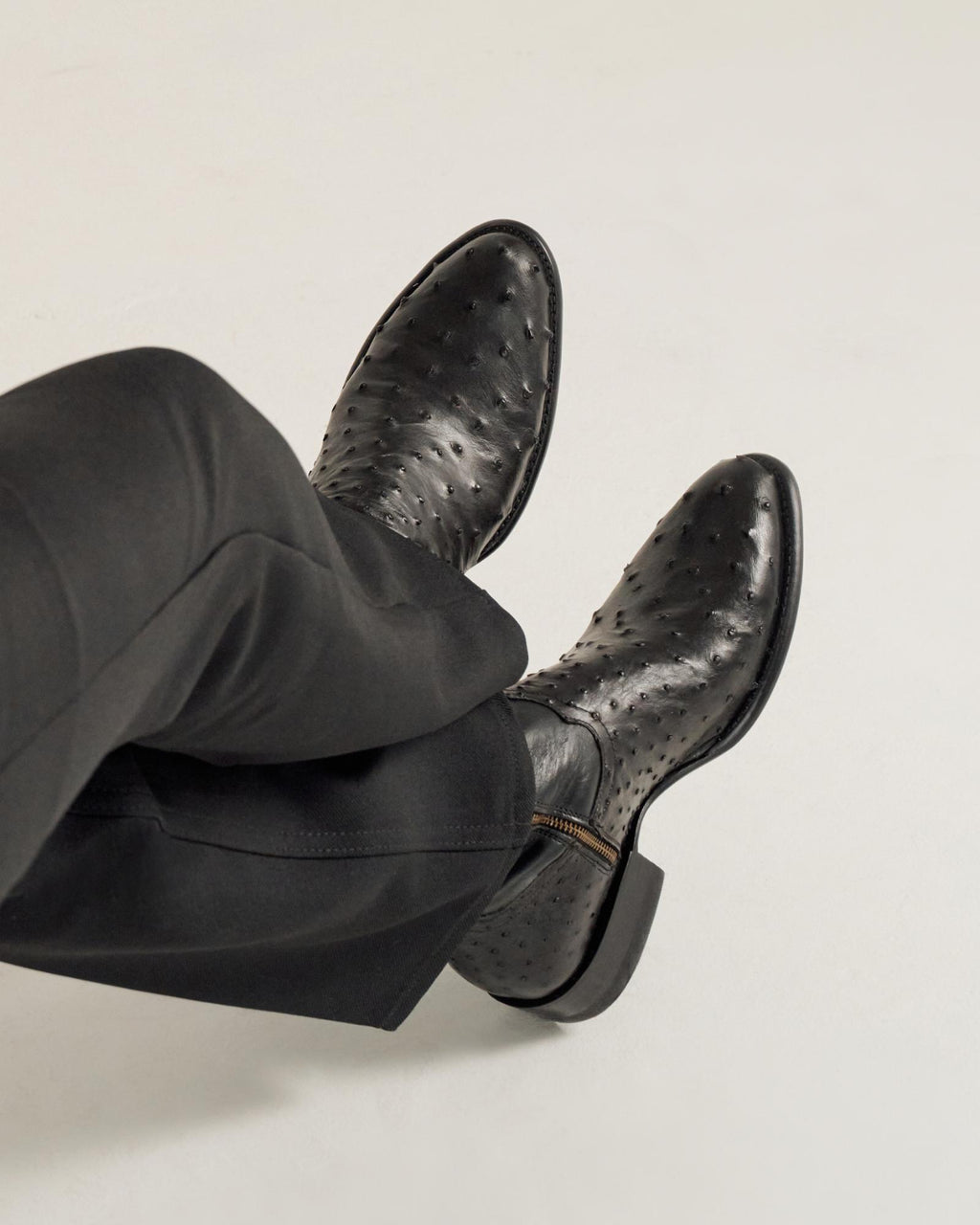 close up of Dean Midnight Black Zip Cowboy Boot on a man's feet 