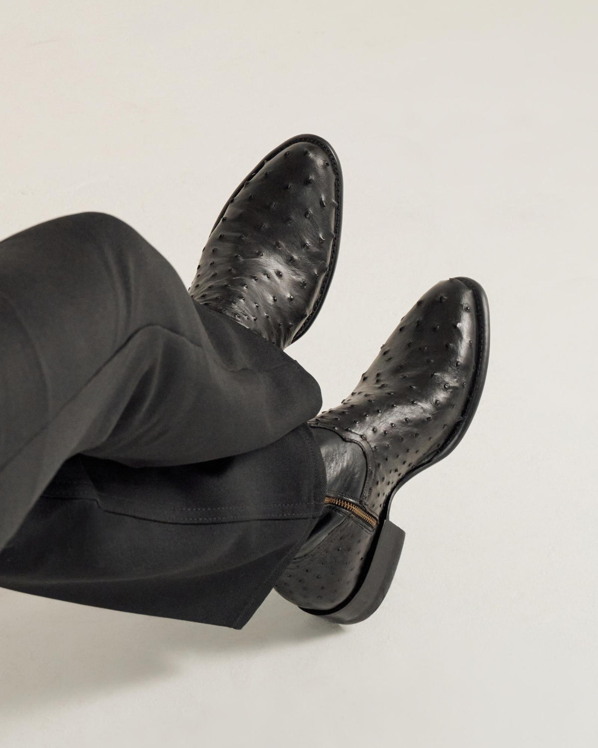close up of Dean Midnight Black Zip Cowboy Boot on a man's feet 