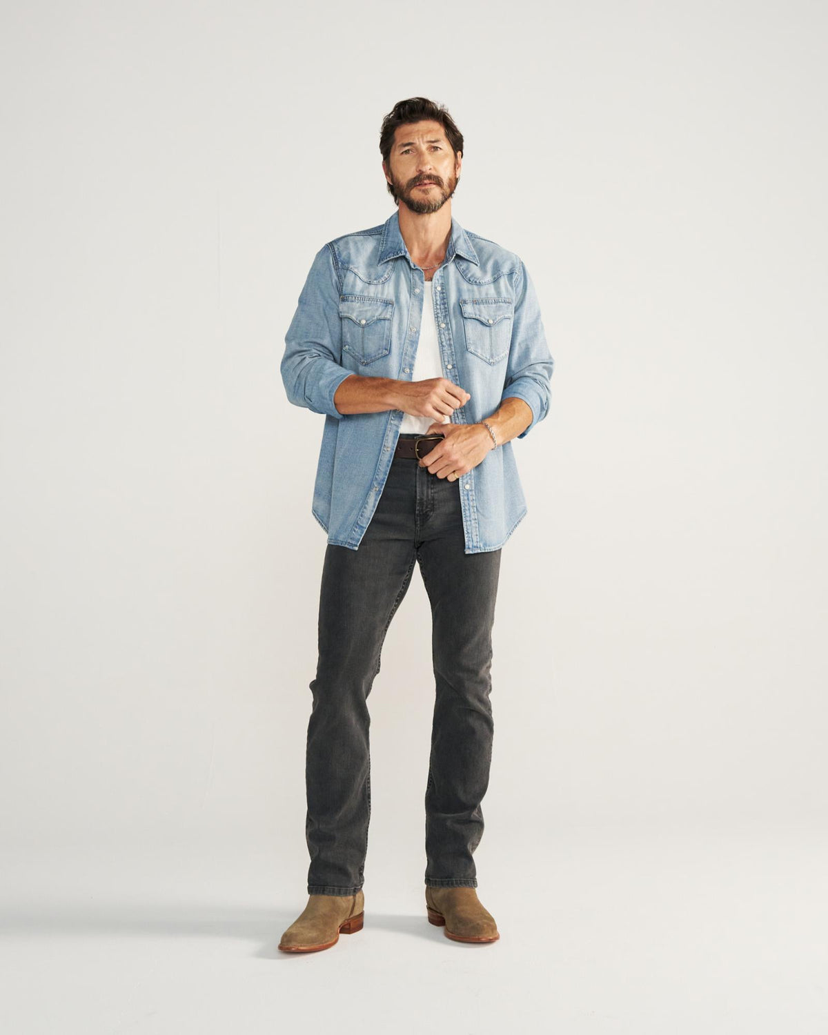 Closeup detail view of Men's Denim Pearl Snap LS - Light Wash