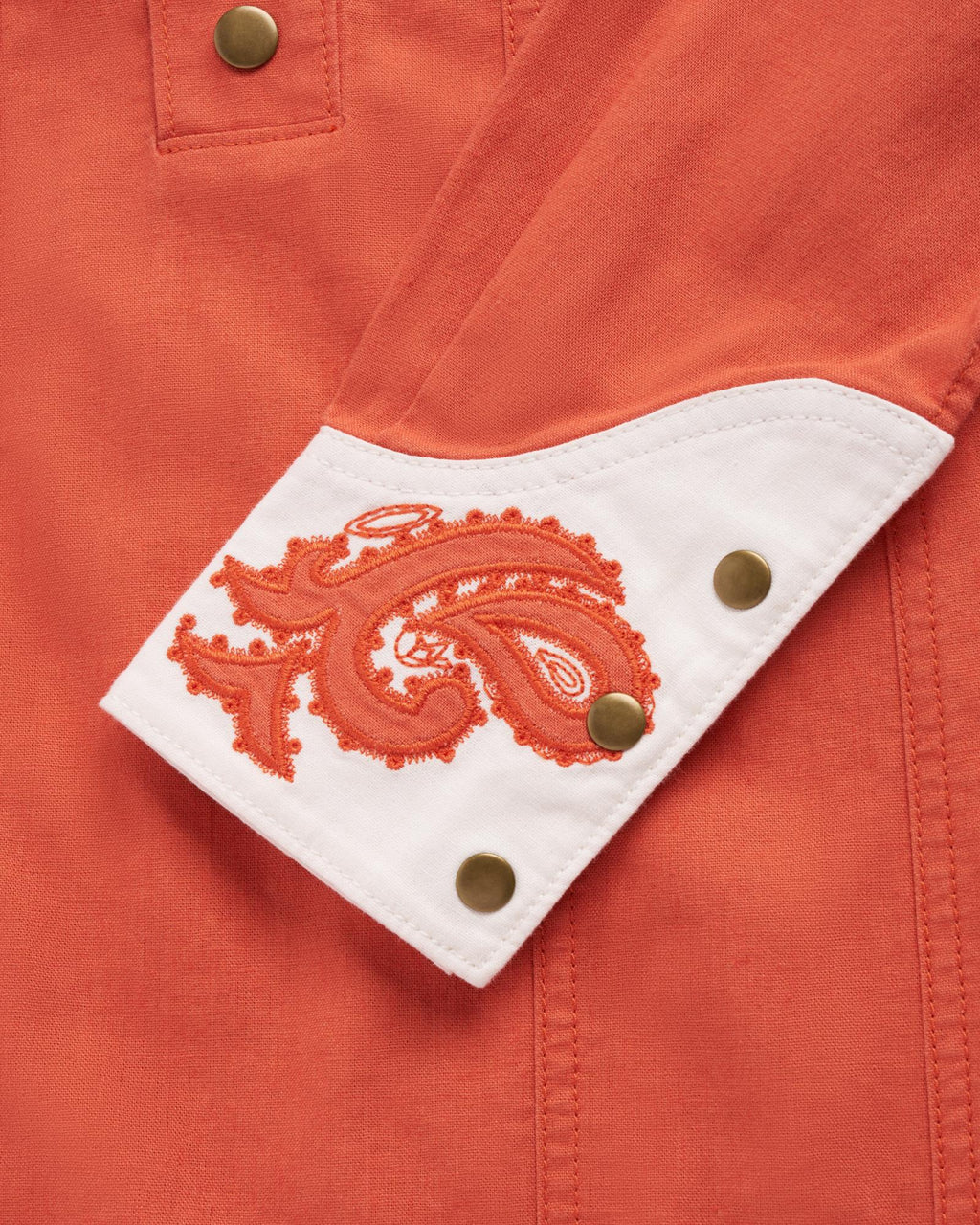 Closeup detail view of Women's L/S Applique Mini Dress - Ginger Spice / Cloud