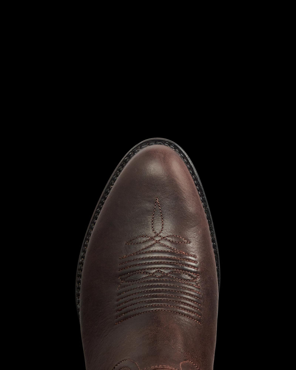 Toe view of The Buck - Clay Goat on plain background